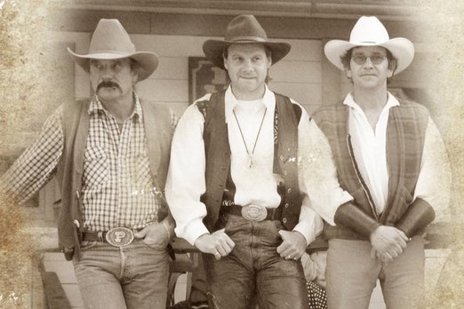 Die Anfänge von Pullman City Drei Männer in Westernkleidung